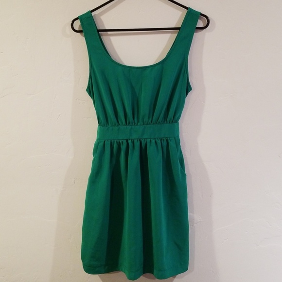 XXI Silky green dress peekaboo back and pockets